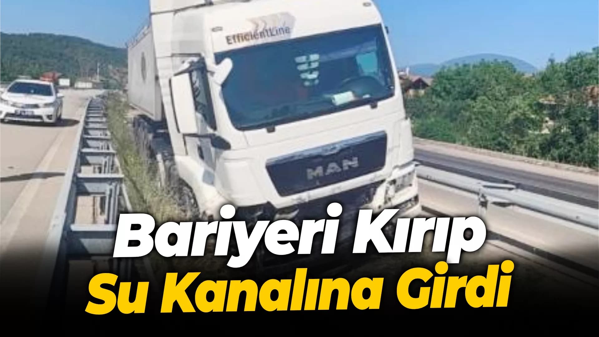 Bariyeri kırıp su kanalına giren tırın sürücüsü yaralandı