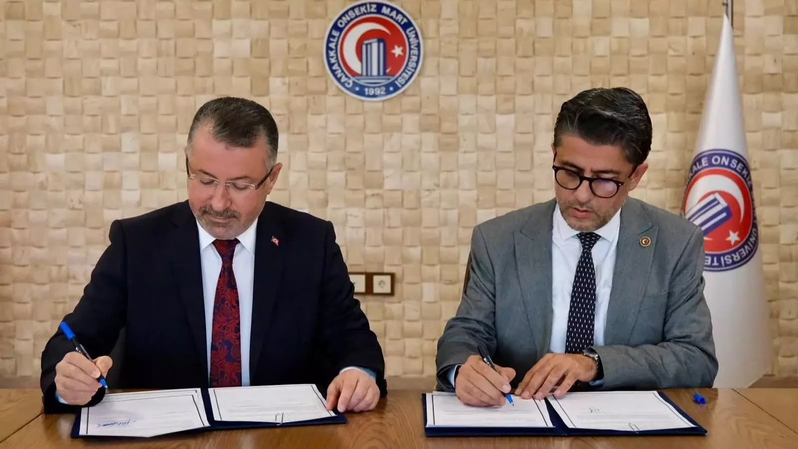 KBÜ ile ÇOMÜ arasında iki önemli protokol imzalandı